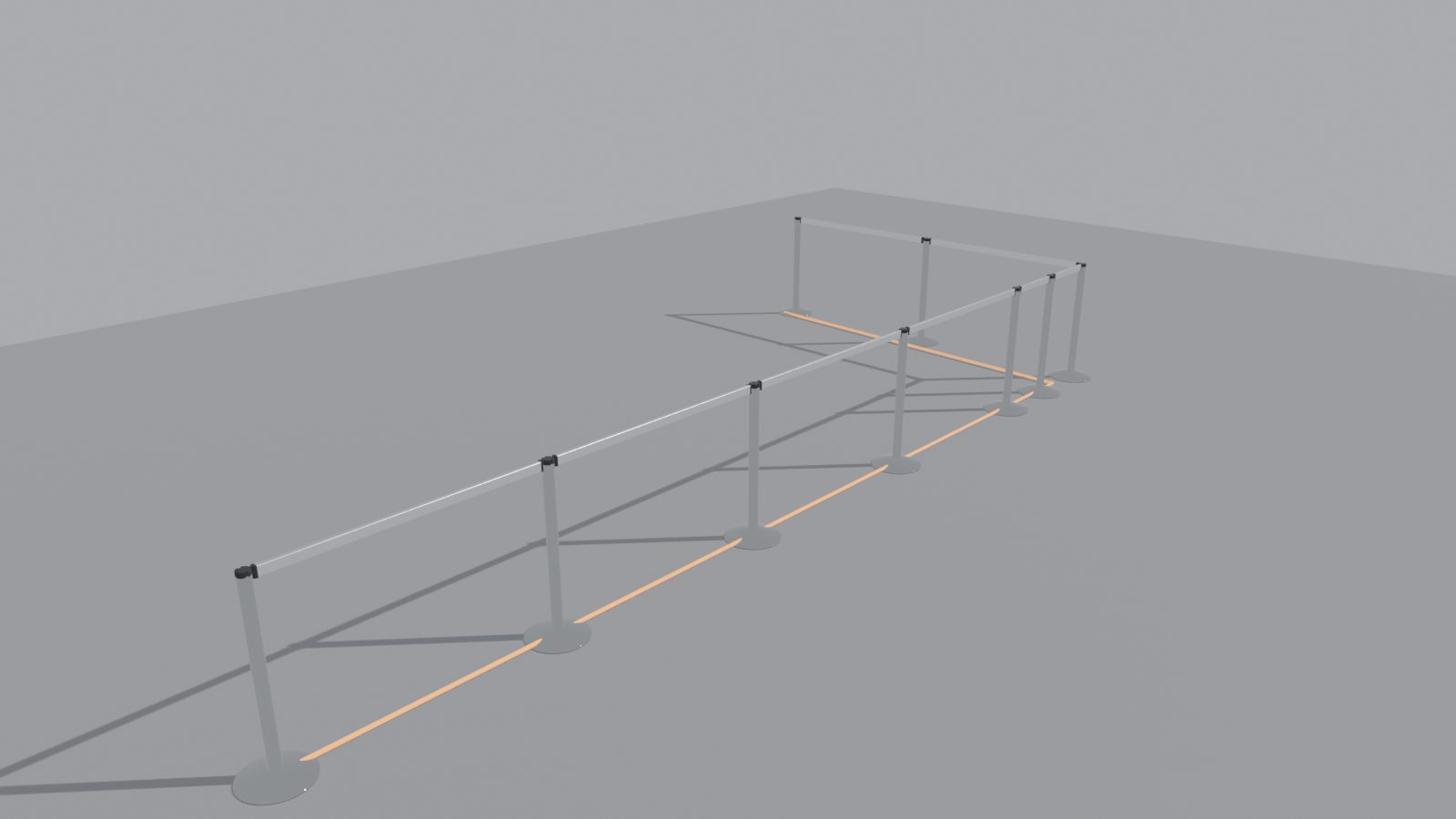 A line of posts and rails turning square corners, with the orange source line on the floor beside it